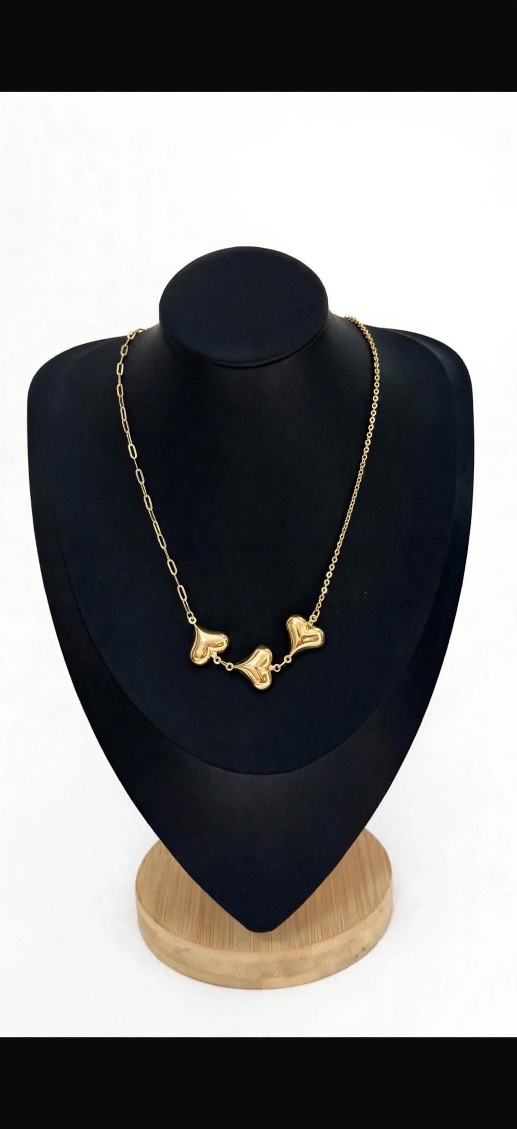 Triple puffy heart gold necklace